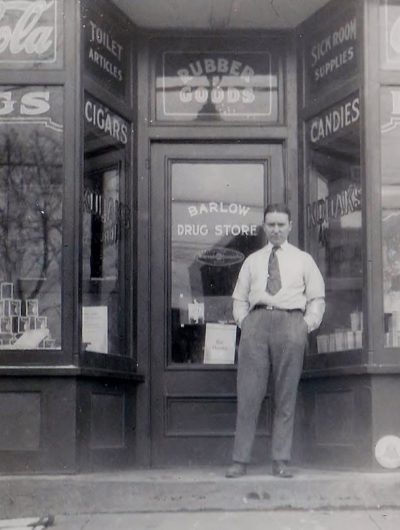 Photo of Kate's grandfather Joe standing outside his drug store circa 1918